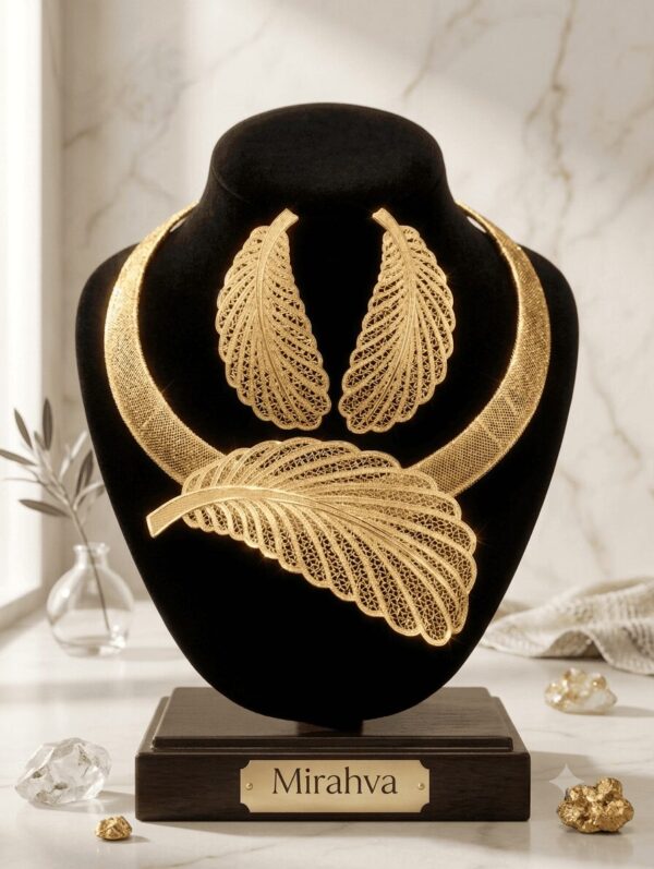 Gemini_Generated_Image_8jo6nj8jo6nj8jo6-1 Mirahva Aurum Ruby Royal Bridal Necklace Set | Luxury Gold-Tone Feather Statement Jewellery Set